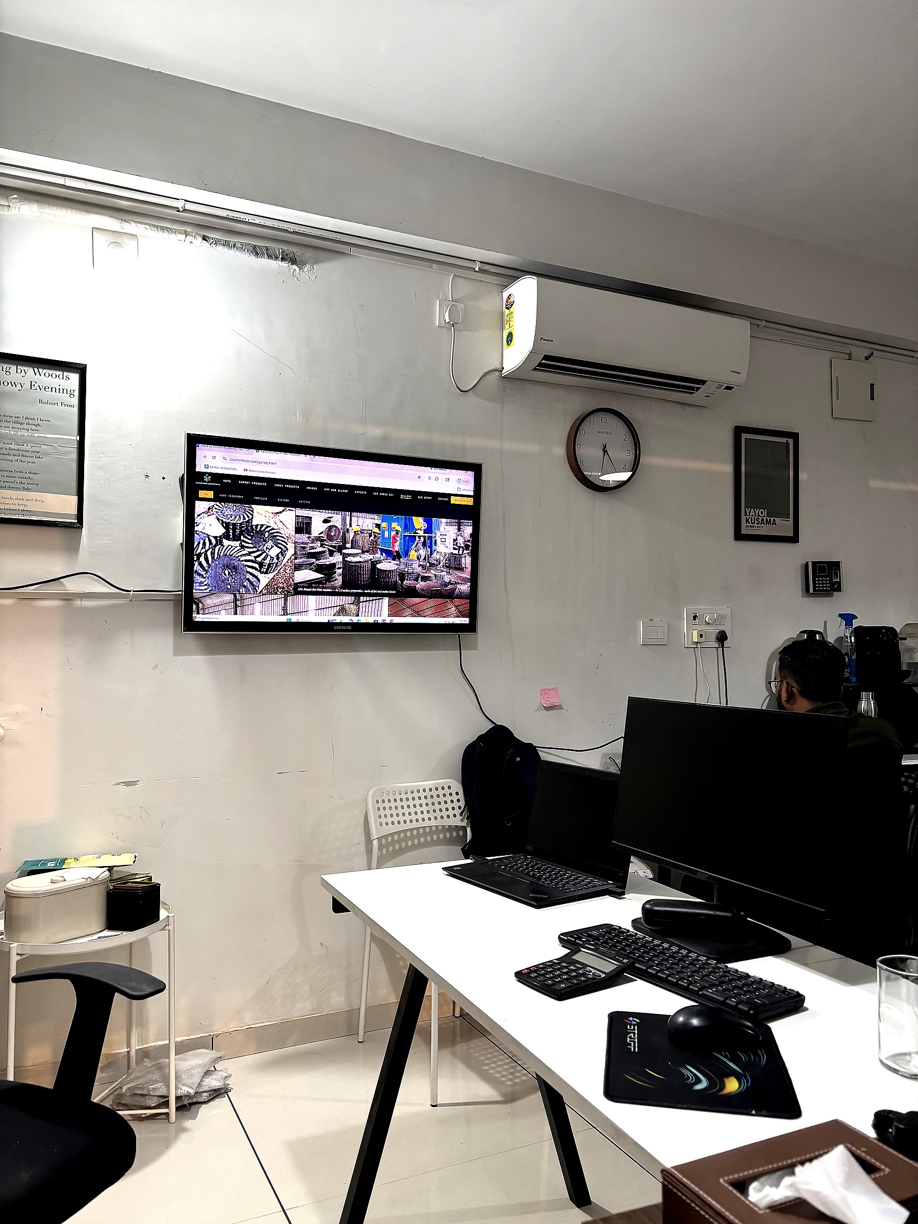 Rajpal office with coulterblade.com on screen
